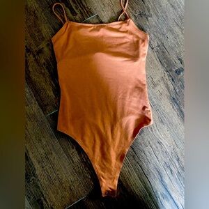 American Eagle orange bodysuit XS